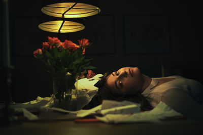 Portrait of boy sleeping on bed at home