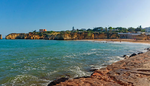 Scenic view of sea against clear sky