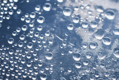 Full frame shot of water drops on glass