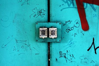 Close-up of mailbox on wall