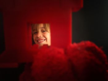 Close-up portrait of smiling girl