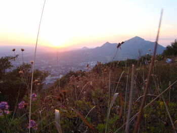 Scenic view of mountains against sky during sunset