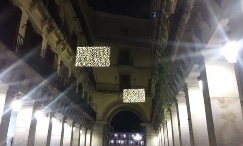 Low angle view of illuminated lamp