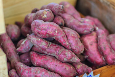 Close-up of carrots for sale at market stall