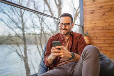 Young man using mobile phone