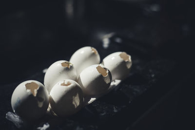 High angle view of bronken eggs on table