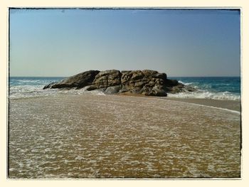 Scenic view of sea against clear sky