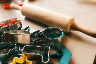 Cropped hand of person preparing food on table