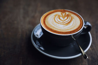 Coffee cup on table