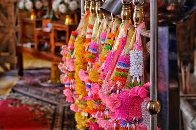 Colorful flower garlands hanging for sale