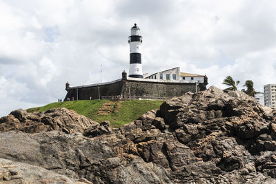 Low angle view of lighthouse against sky