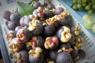 High angle view of grapes in container