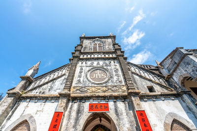 Low angle view of historical building against sky