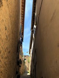 Narrow alley along buildings