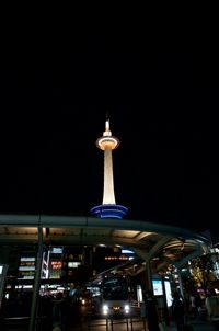 Low angle view of illuminated street light at night