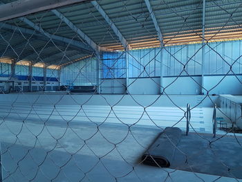 Low angle view of metal fence