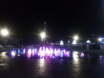 Illuminated street lights at night