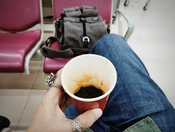 Man holding coffee cup