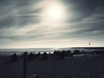 Scenic view of beach against sky during sunset