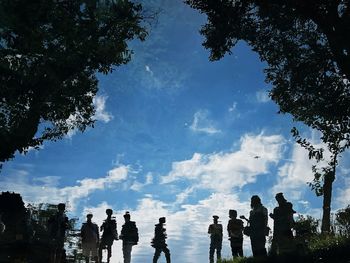 Low angle view of trees against sky