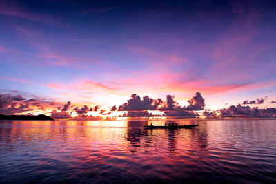 Scenic view of lake against sky during sunset