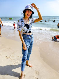 Full length of woman on beach