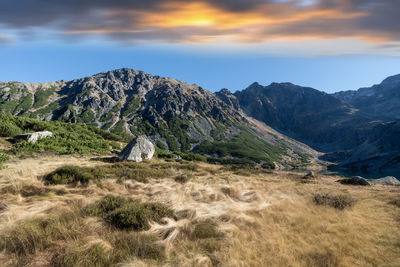 Scenic view of mountains against sky during sunset