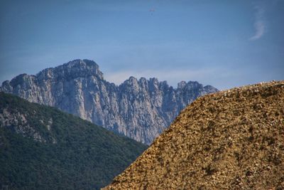 Scenic view of rocky mountains against sky