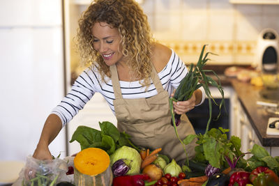 Young woman with vegetables