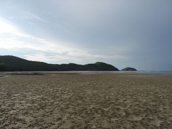 Scenic view of beach against sky