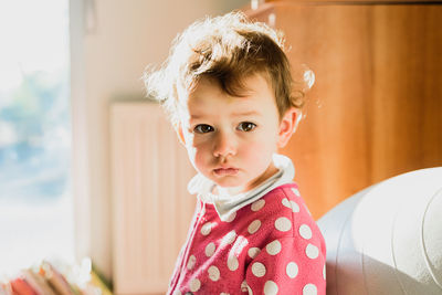 Portrait of cute boy at home