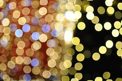 Defocused image of illuminated christmas lights