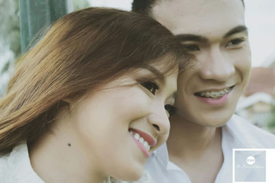 Close-up of smiling young woman