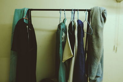 Close-up of clothes hanging on rack