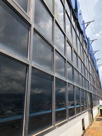 Low angle view of modern building against sky