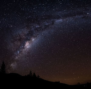 Low angle view of stars against sky at night