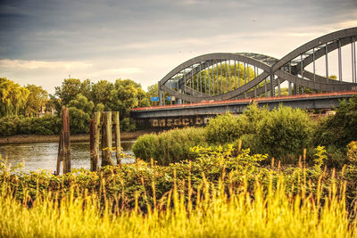 Bridge over river against sky