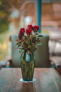 Close-up of flower vase on table