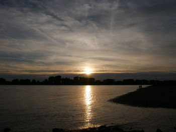 Scenic view of sea at sunset