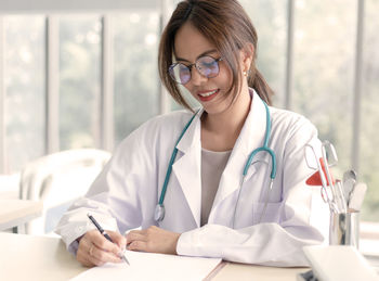 Young businesswoman working at clinic