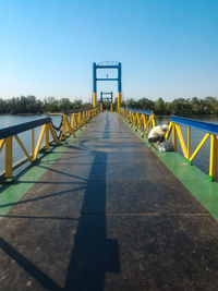 Bridge against clear blue sky