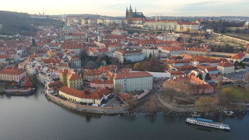 High angle view of river amidst buildings in city