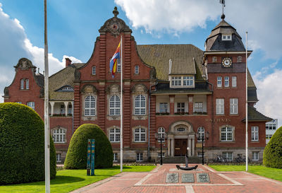 Facade of historic building against sky