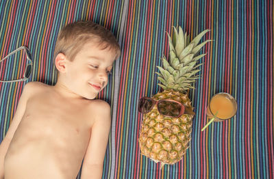 Portrait of smiling boy holding food