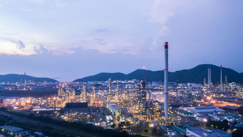 Twilight city and landscape view refinery oil and lpg in thailand aerial view from drone