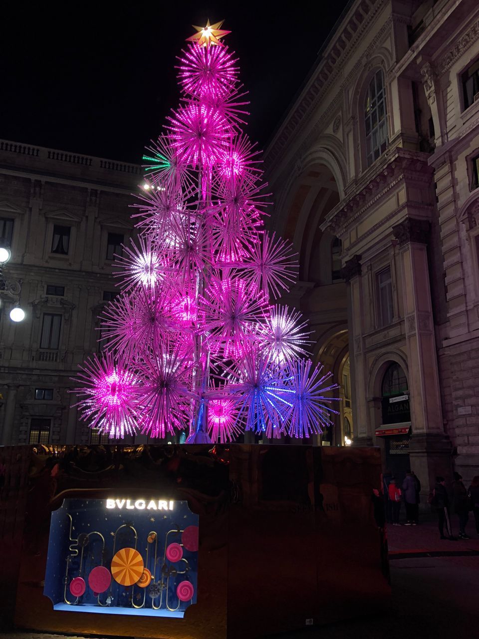 LOW ANGLE VIEW OF ILLUMINATED BUILDING