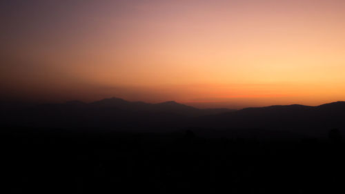 Silhouette of mountains at sunset