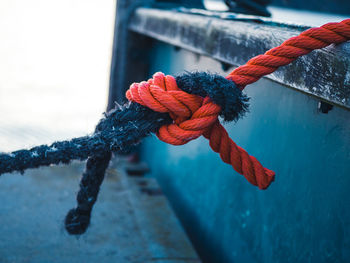 Close-up of rope tied on metal