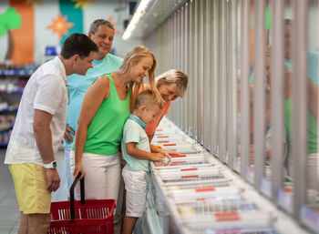 Family shopping together in store