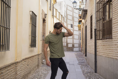 Man posing on a street